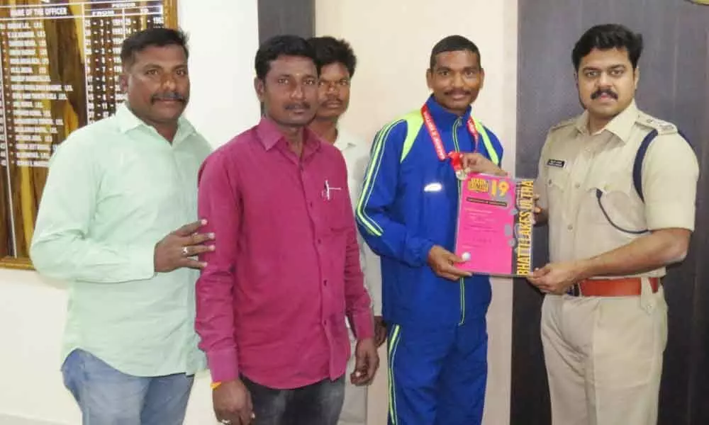 Adilabad police Constable wins gold medal in marathon