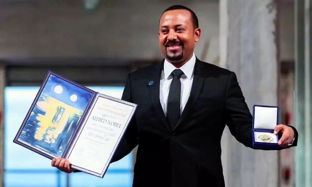 Pressured at home, Ethiopia PM picks up Nobel Peace Prize