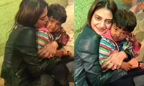Nusrat Jahan shares pictures on Instagram with a baby boy selling balloons. Internet loves it