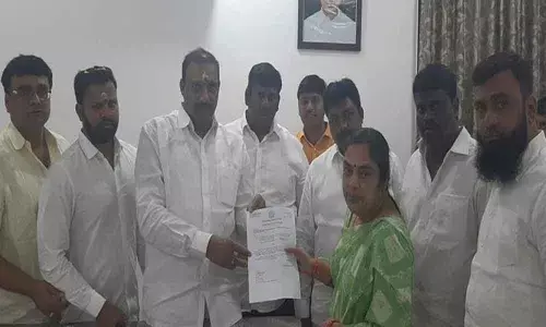 MLA Arekapudi Gandhi hands over CMRF cheques