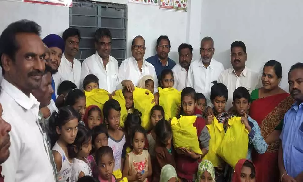 Allwyn colony: Clothes distributed to children