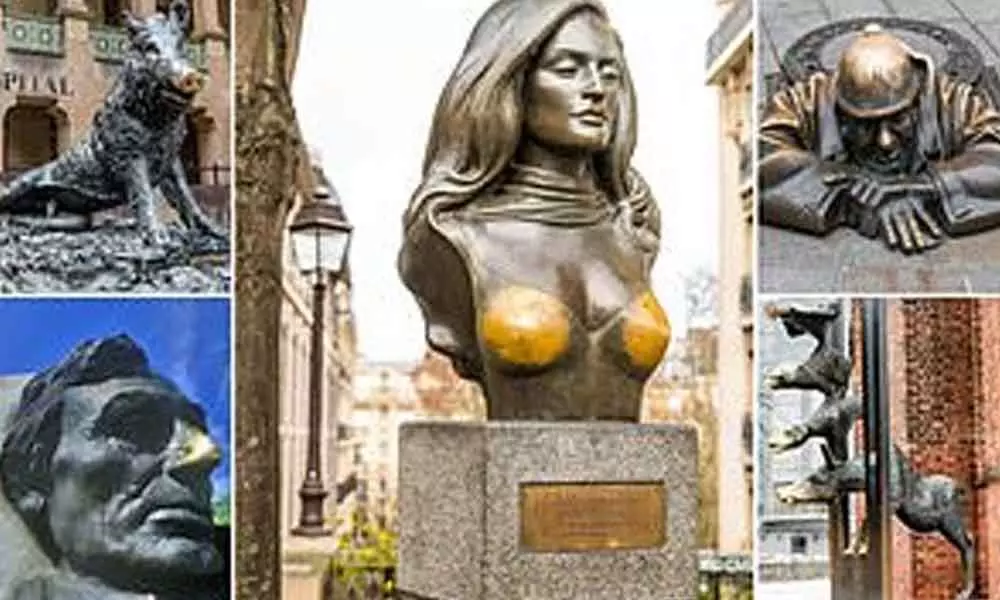 15 statues around the World if touched gets good fortune- From Bronze Breasts in Paris to Lincolns nose in Illinois