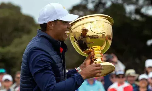 Its been an honour says emotional Woods after Presidents win