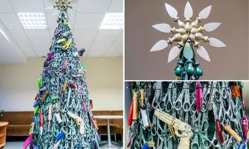 Christmas tree with bullets and scissors