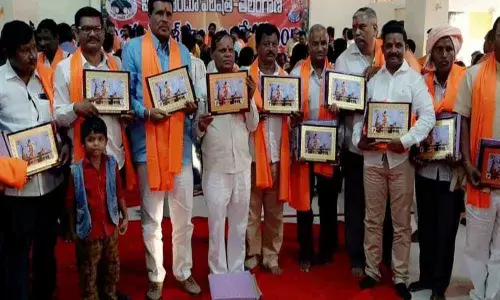 Tandur: Kar sevaks felicitated