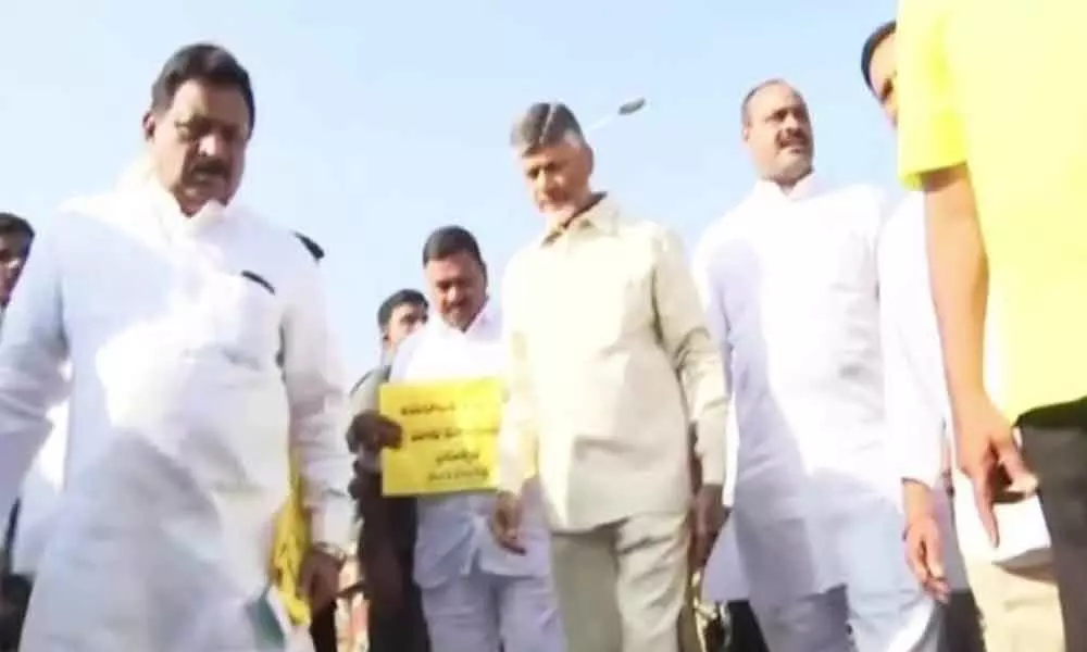 TDP held reverse walk at assembly in protest to reverse tendering policy implemented by government
