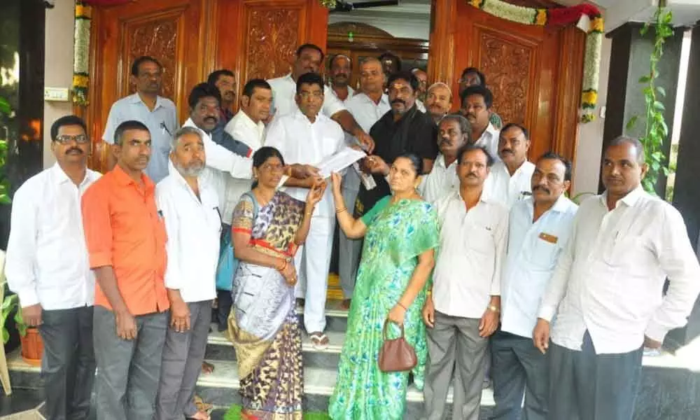 Khammam: Employees plea to MP Nama Nageswara Rao seeking funds for the construction of function hall