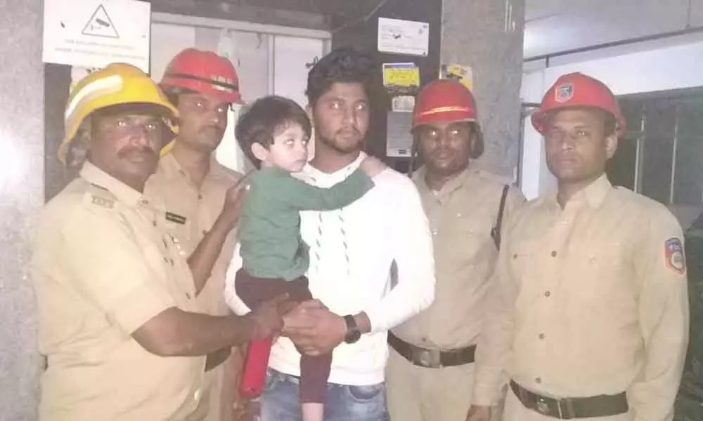 Fire staff rescue kid stuck in lift at Abids