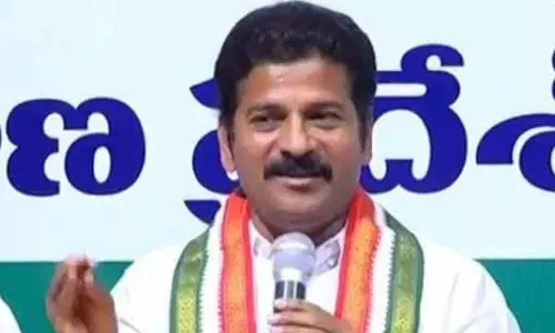 KST behind hike in liquor prices: Revanth