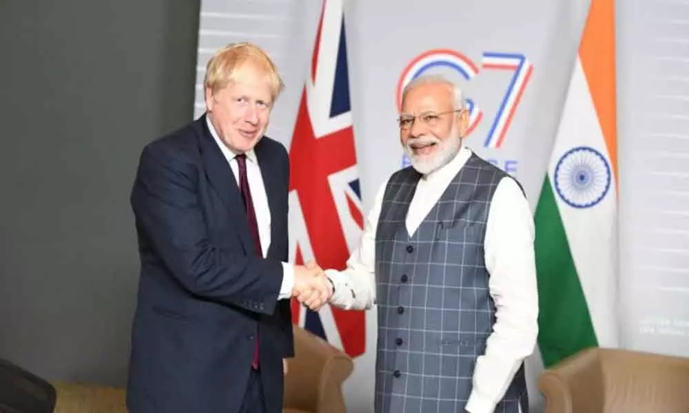 PM Modi wishes Johnson on his re-election as British PM