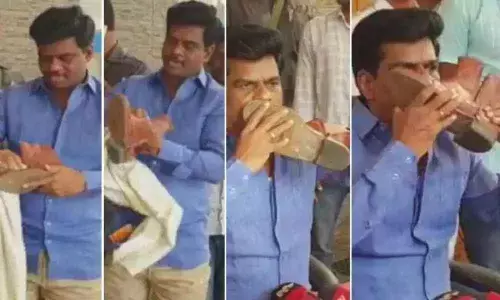 MP Gorantla Madhavs dramatic counter to JC Diwakar Reddy, Kisses police boot in the Press meet