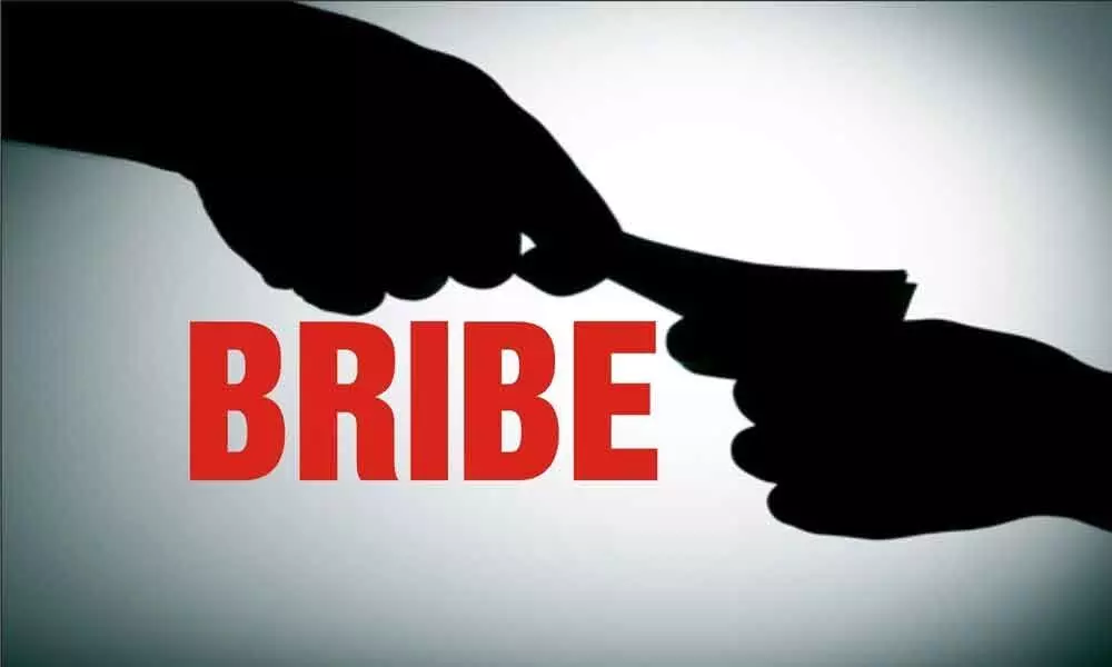 Deputy Tahsildar caught while accepting bribe in Vikarabad