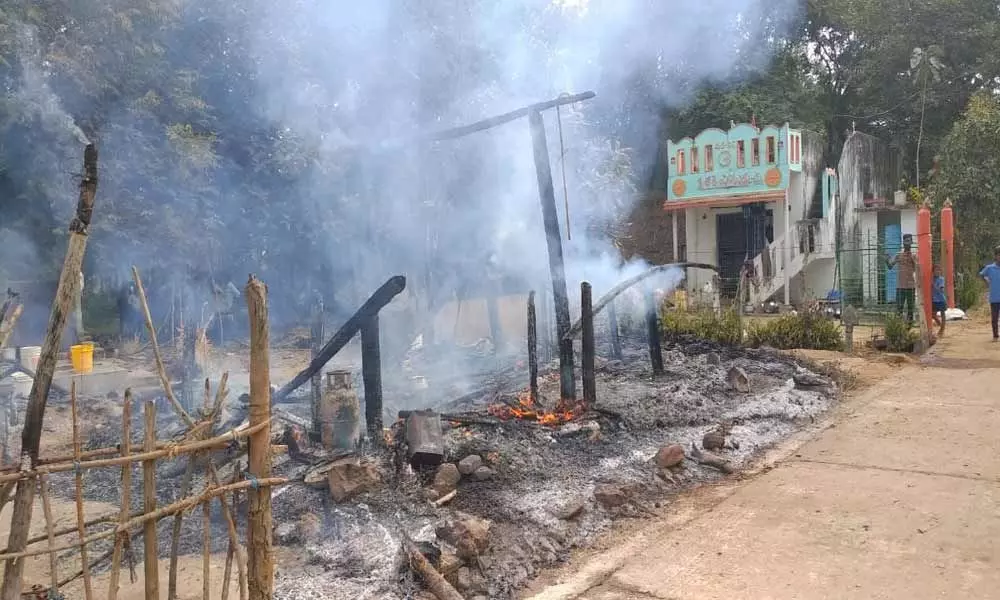 Four injured and two thatched houses gutted after a massive cylinder blasted in Vizianagaram