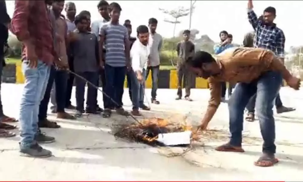 Karimnagar: Student union leaders burn Manusmriti