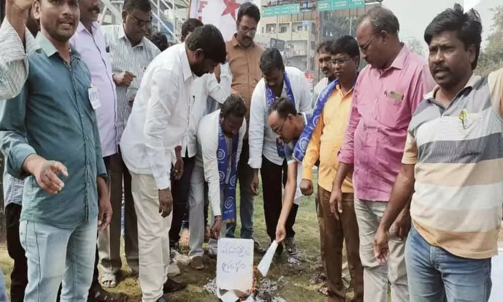 Mancherial: Dalit Sangam leaders burn Manusmriti copies