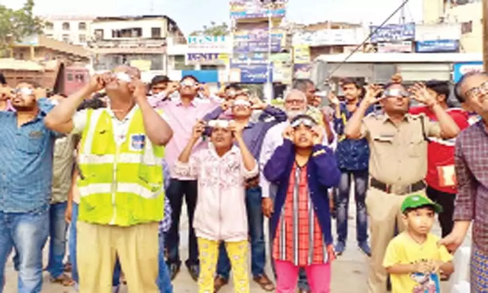 Vignana Vedika organises public viewing of eclipse at ECIL crossroads