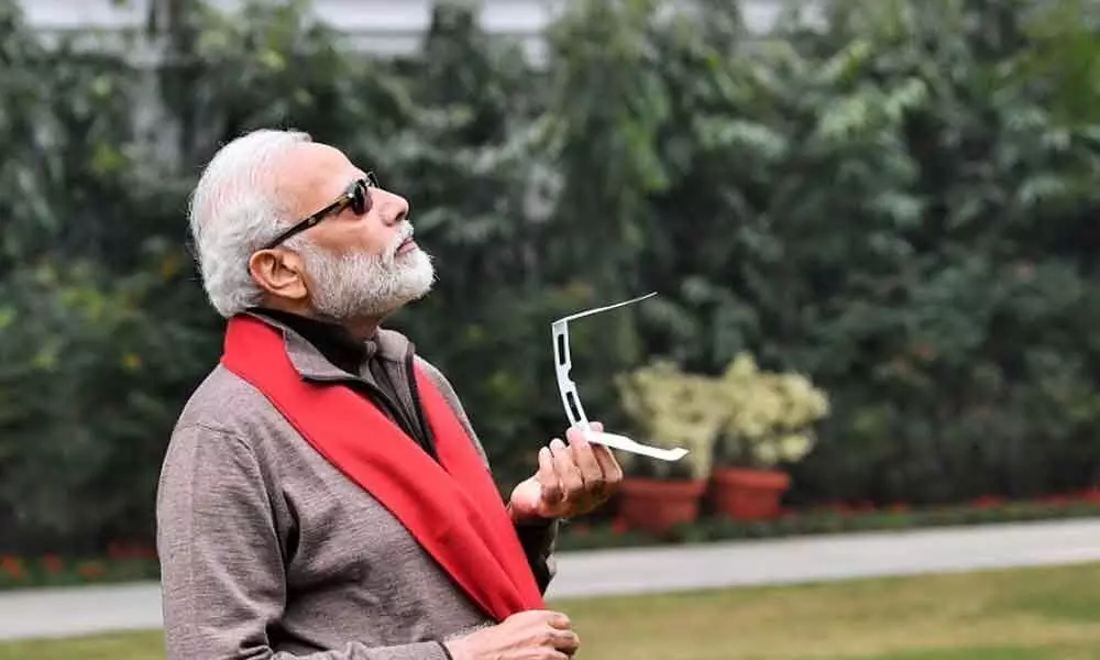 PM Narendra Modi catches a glimpse of solar eclipse