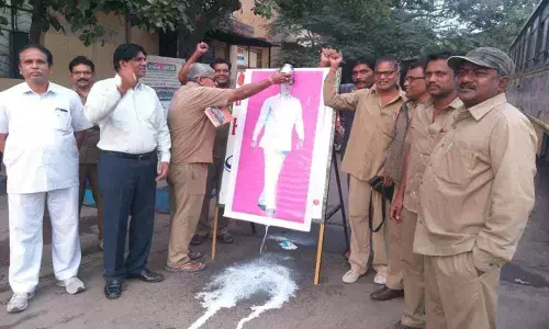 Palabhishekam to KCRs portrait in Musheerabad