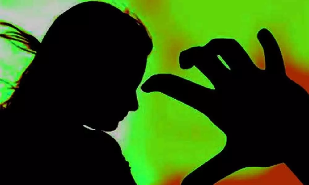 Man raped a minor girl with help of his wife in Guntur district