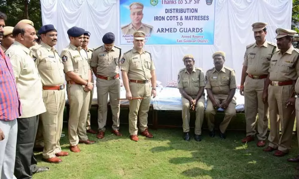 SP Adnan Naim Asmi distributes iron cots to constables in Kakinada