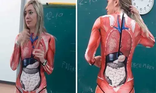 Teacher in Spain wears body suit showing organs  to teach Anatomy. Students freak out