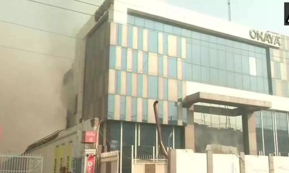 Several feared trapped after burning factory collapses in Delhi