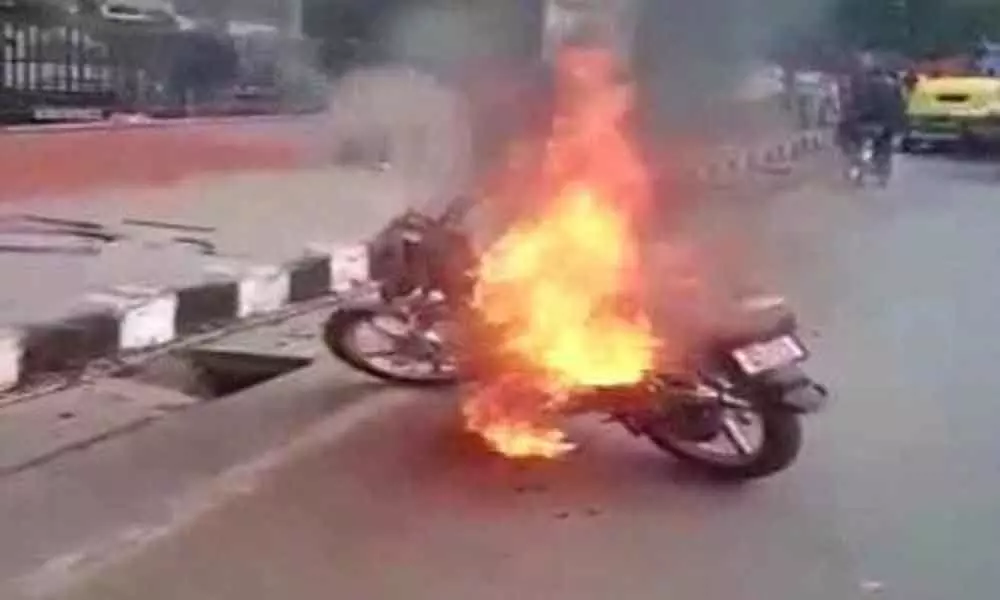 Delhi man sets bike on fire after being challaned for riding without helmet, arrested