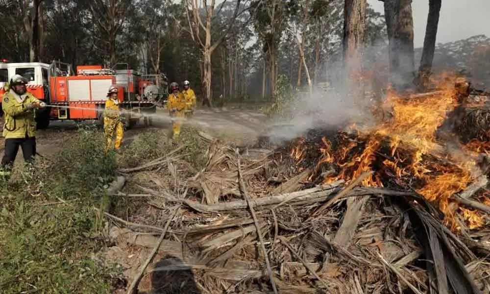 In never-before act, Australia calls up military reserves to tackle bushfire crisis