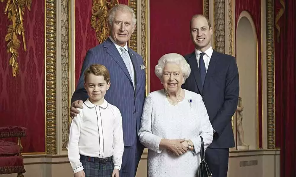 Britains queen in new photo portrait with 3 heirs to throne