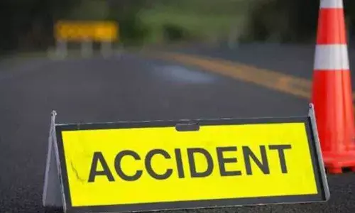 12 injured as the tourist bus catches fire after hitting a lorry in Srikakulam