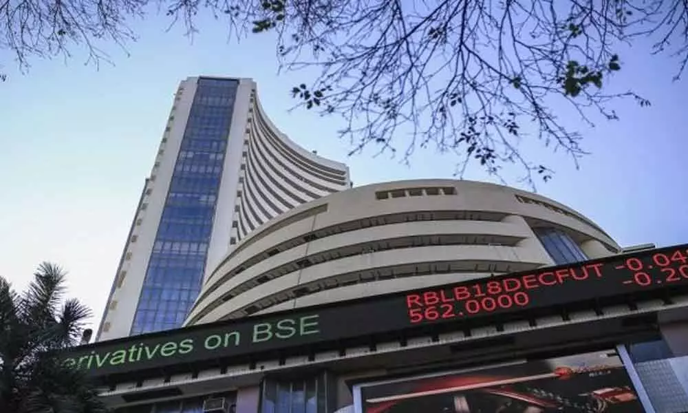Sensex rebounds 193 points; Nifty reclaims 12,000