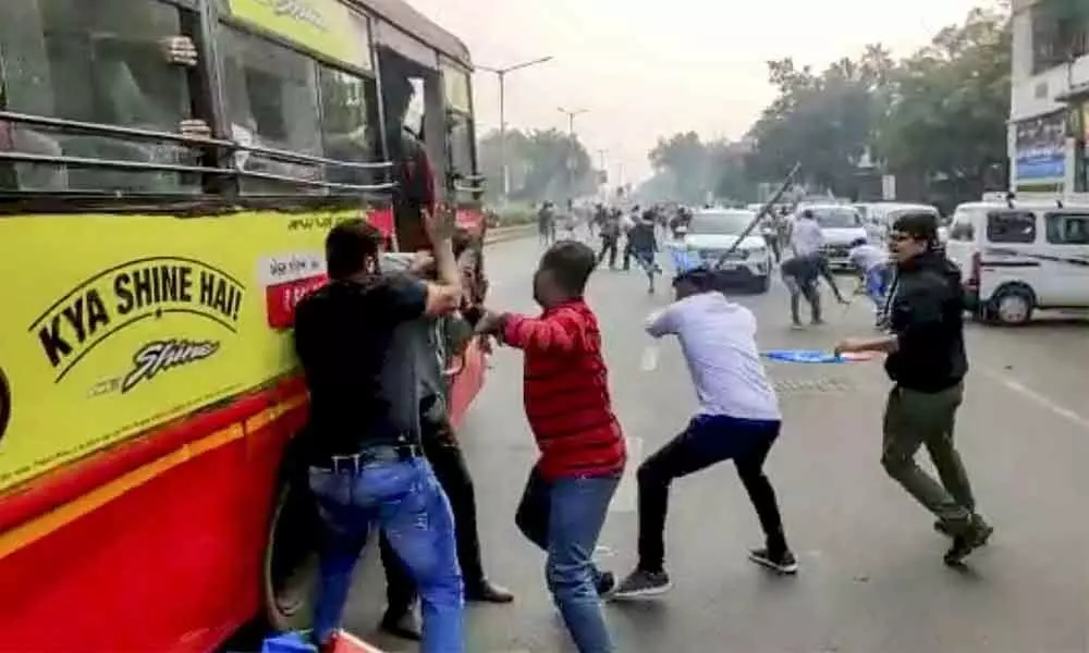 Masked men attack JNU profs, students : Hindu group claims responsibility