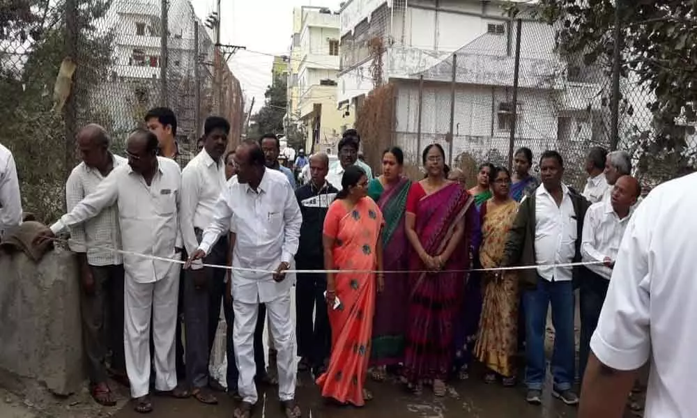 Corporator Thota Anjayya, officials inspect bridge