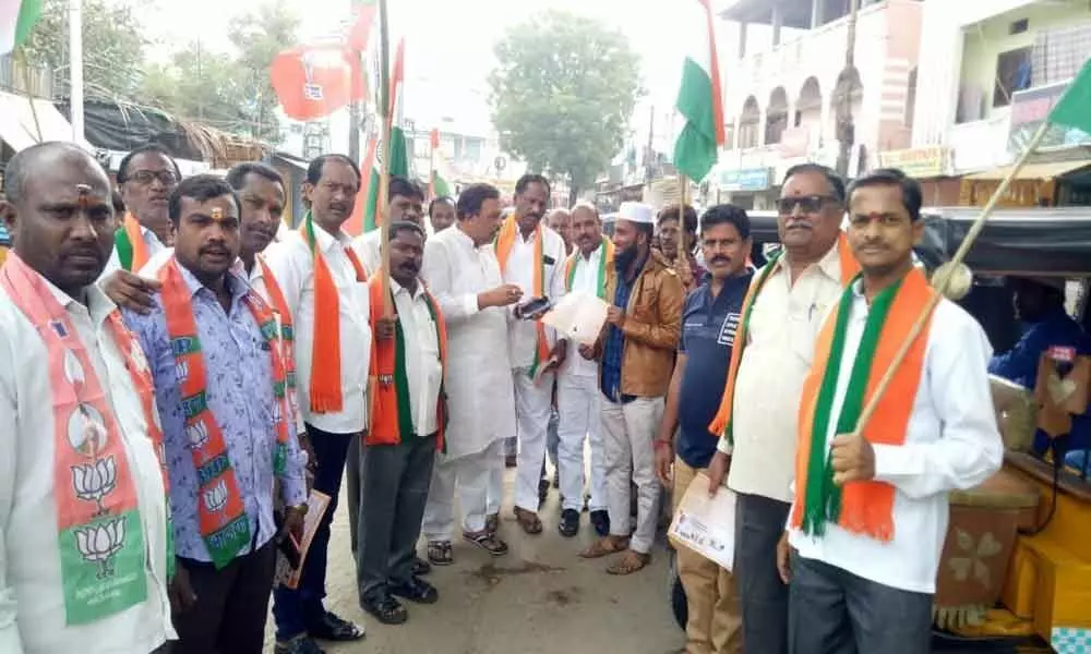 BJP conducts door-to-door campaign on CAA at Patel Nagar of Amberpet division