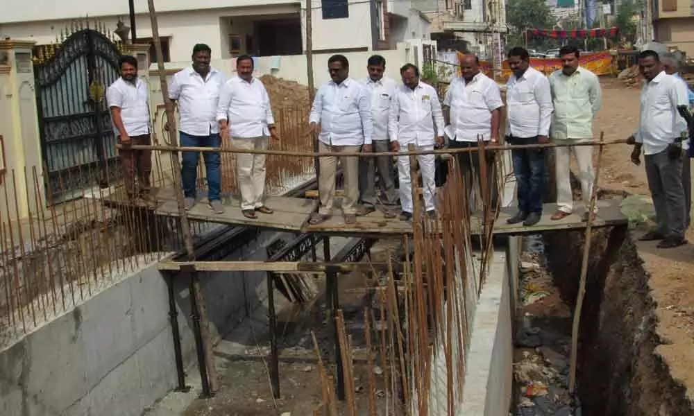 MLA Bethi Subash Reddy, corporator Pannala Devender Reddy launch drainage works in Bhavaninagar