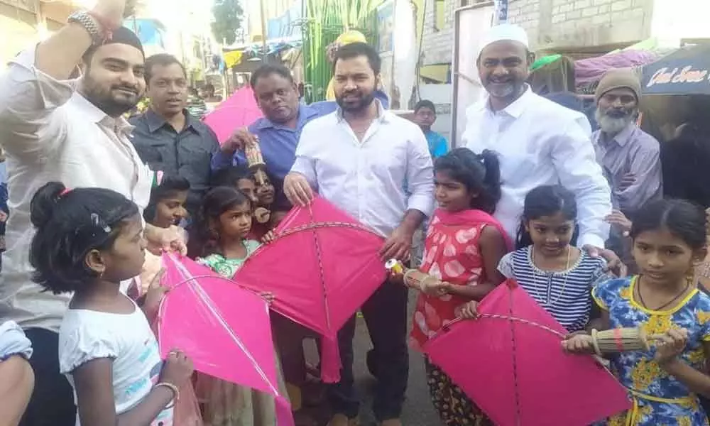 Kites distributed to children at Visakha Bapuji Nagar