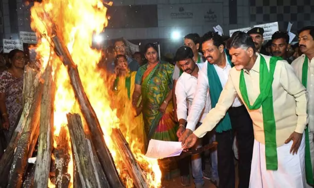 Amaravati celebrates Bhogi by consigning the GN Rao and Boston committee reports in bonfire