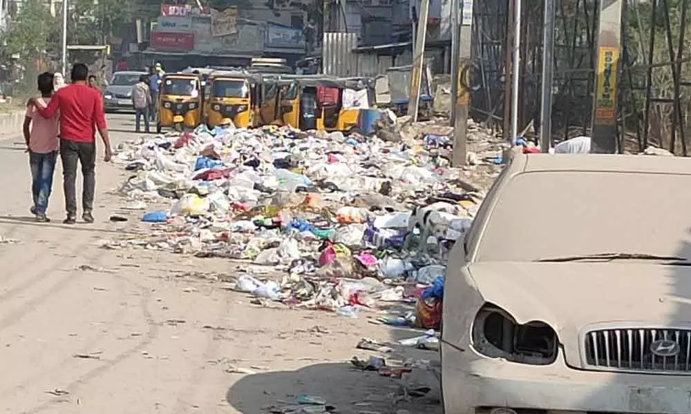 Garbage dumped on roadside near Gayathri Nagar