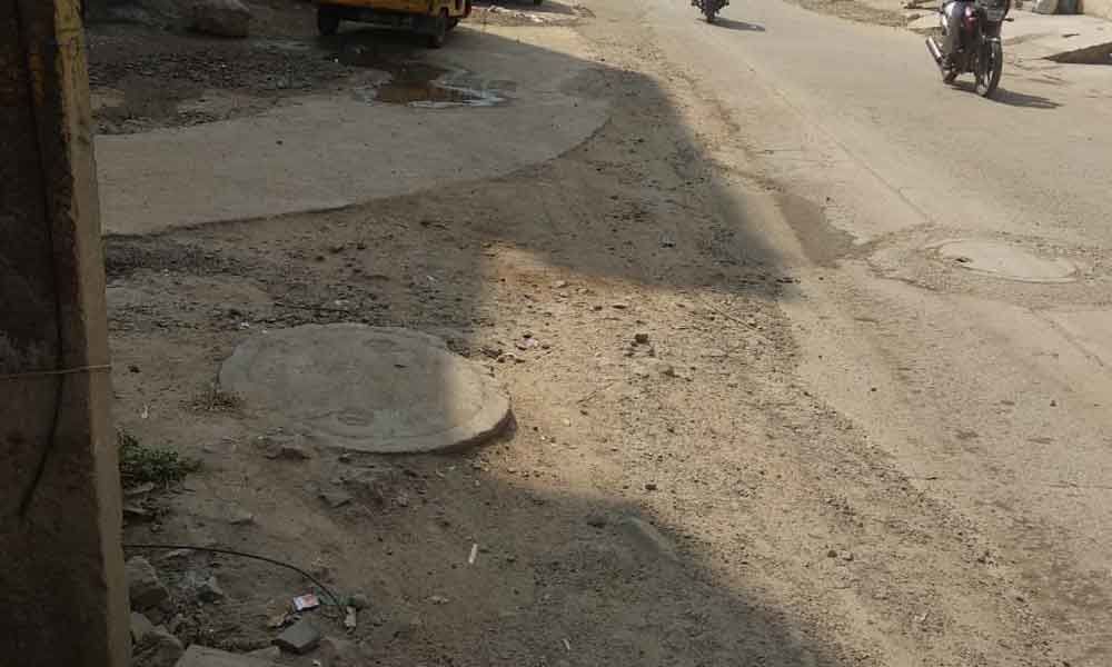 Road dug up for development works, not restored