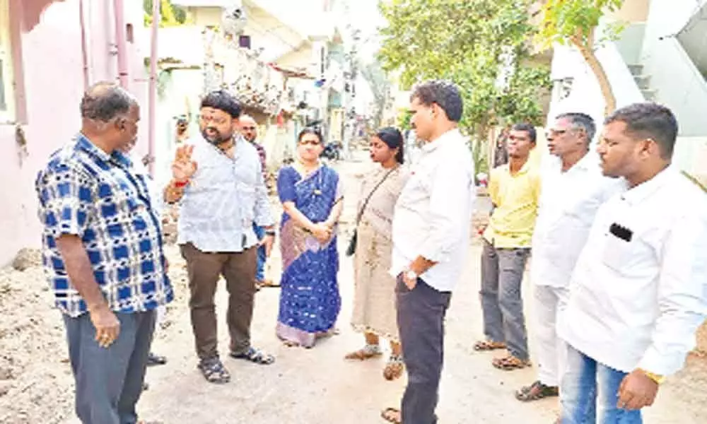 Corporator Shanthi inspects civic works at Raghavendra Nagar