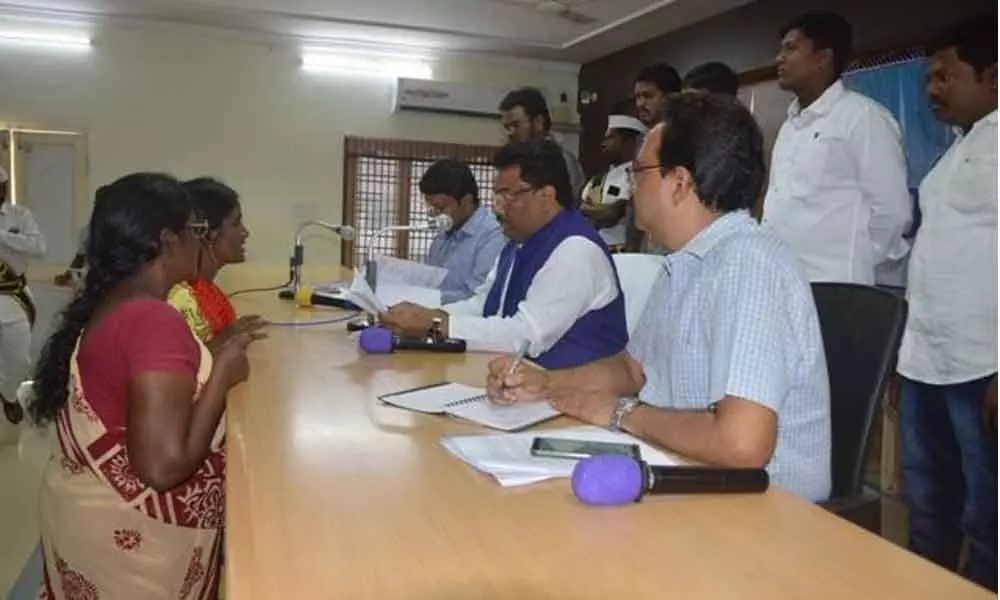 Karem Shivaji receives petitions from tribals in Rajamahendravaram
