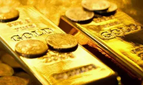 On global cues, gold rates rise marginally
