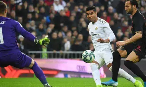 Real Madrid take La Liga top spot after Sevilla win