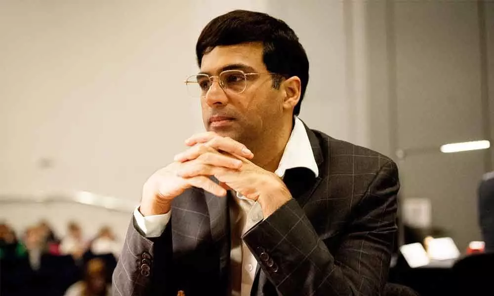 Anand tricked by Caruana; Carlsen wins first game