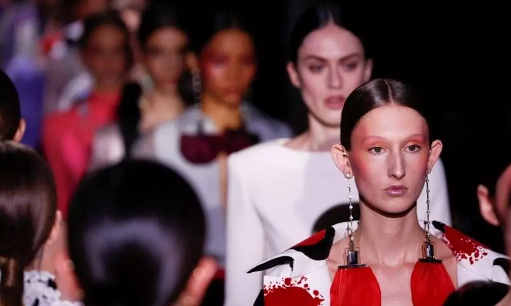 Italian Fashion label Valentino adds a twist to Vibrant colors to classic gowns for Paris Show