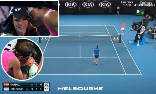 Australian Open: Rafael Nadal comforts ballkid with a peck on the cheek after accidentally hitting her on head (video)