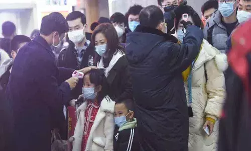 China shuts down transport in eight cities around virus epicentre