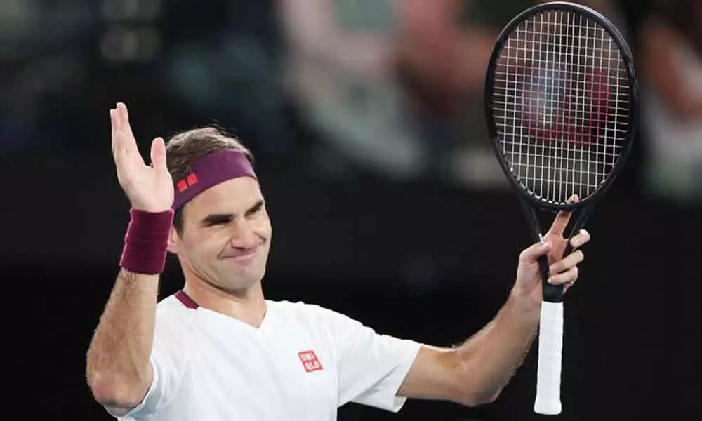 Federer overcomes slow start