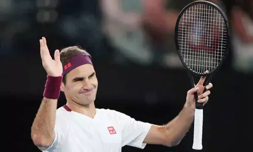 Federer overcomes slow start