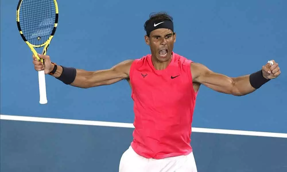Nadal bags grudge match to keep heat on Federer record